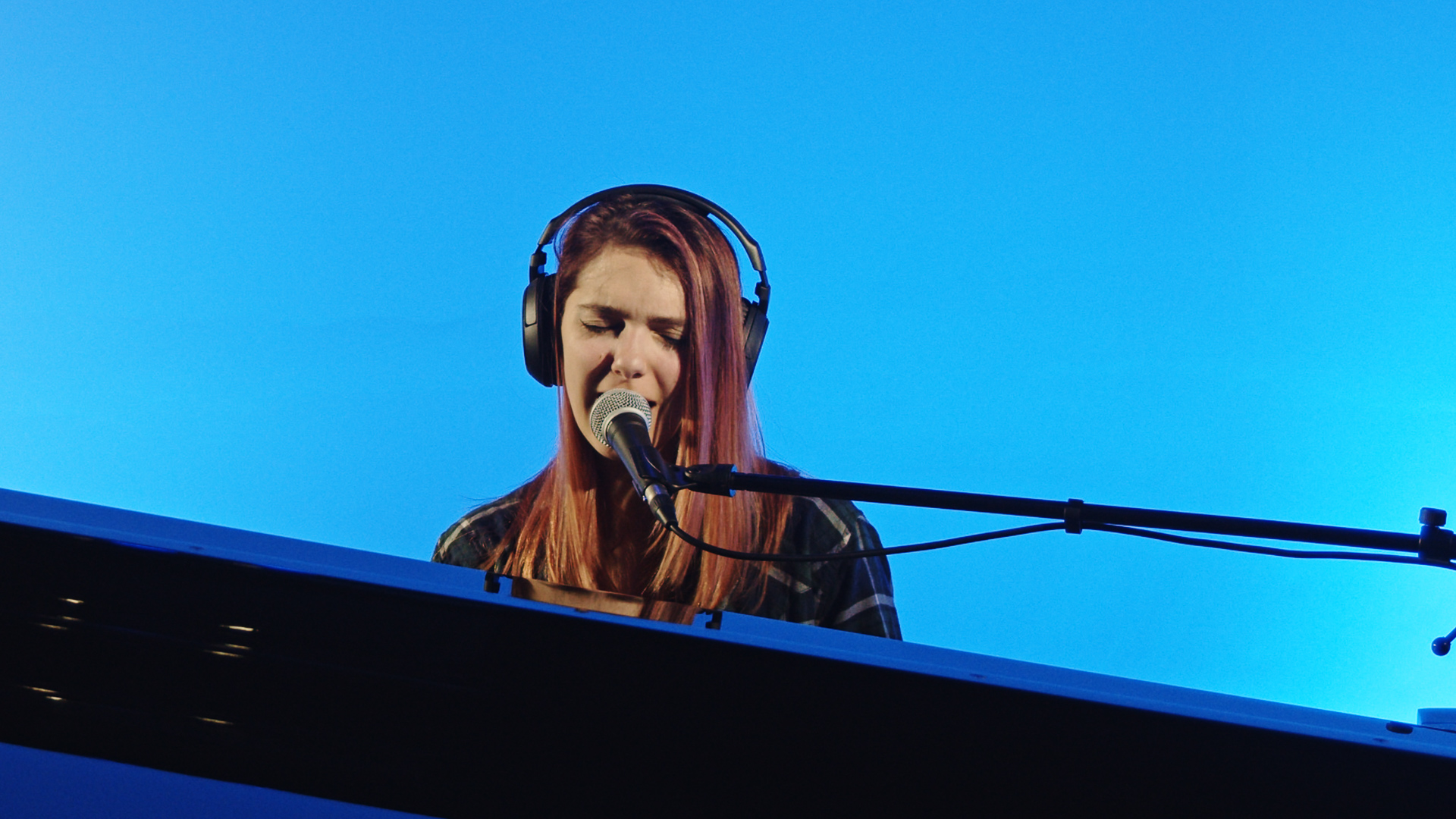 Singer Songwriter Jena Rhys sings her original song entitled Rescue